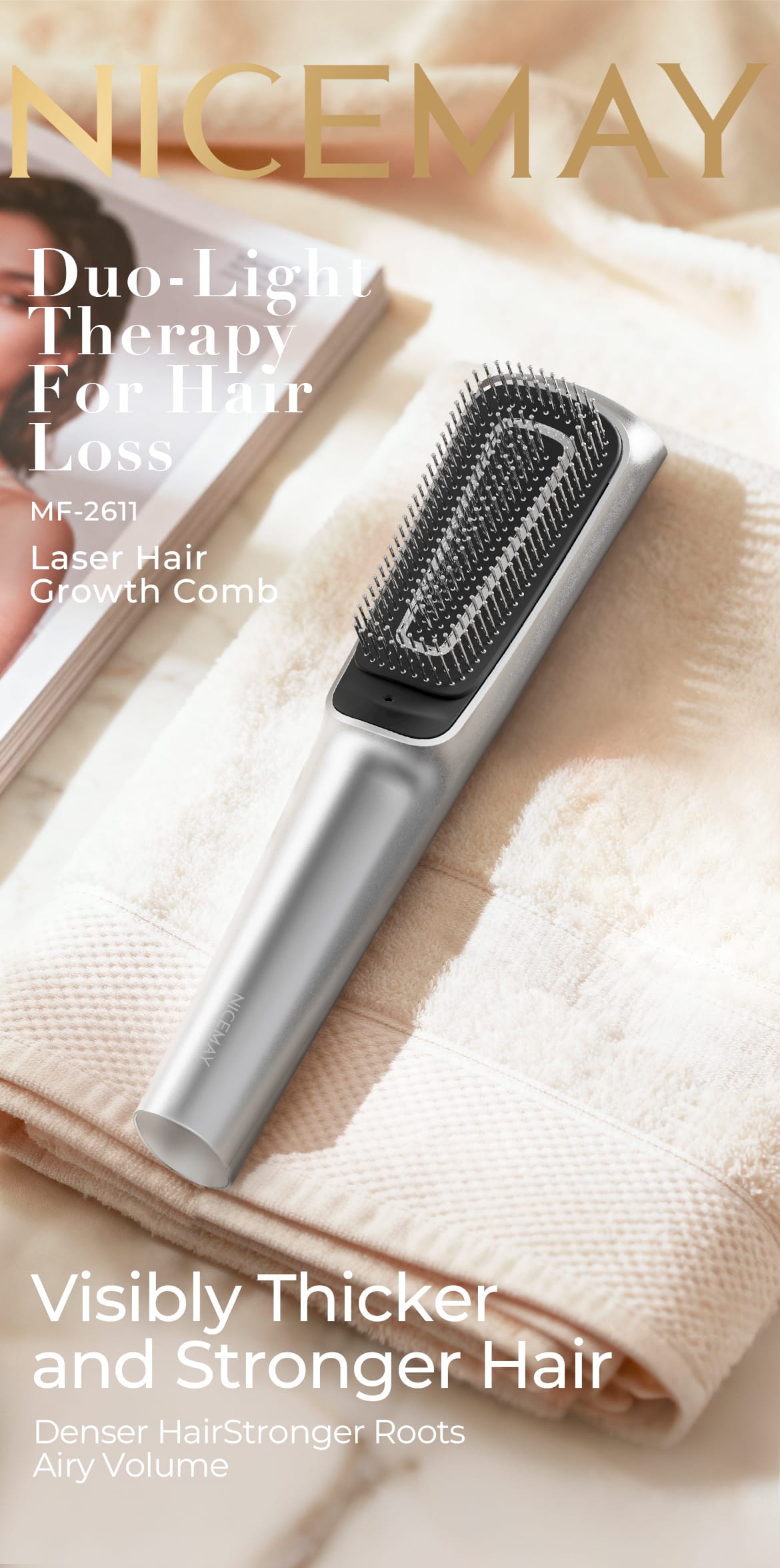 NICEMAY MF-2611 silver laser hair growth comb displayed on soft towels.