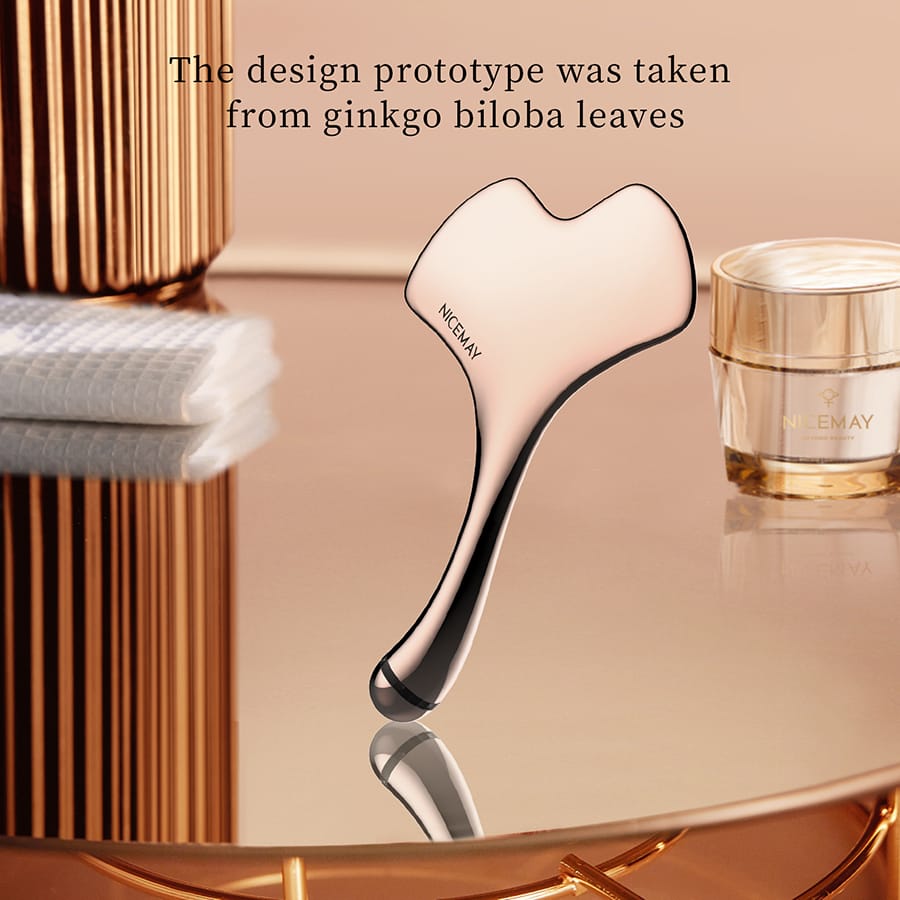 NICEMAY 2338 gua sha facial massager with a ginkgo-leaf-inspired design.