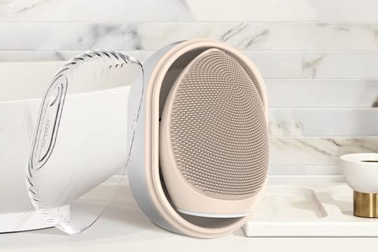 NICEMAY MR-1969 silicone facial brush displayed beside its compact rear housing.
