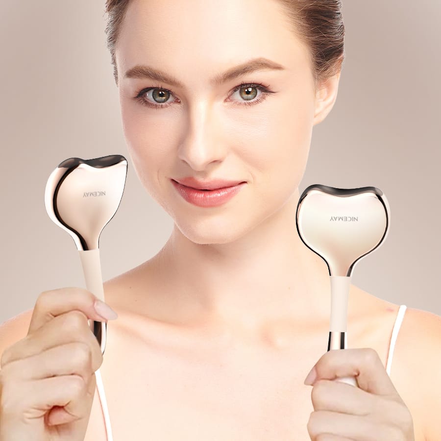 Woman holding two NICEMAY MR-2389 facial and body massage devices.