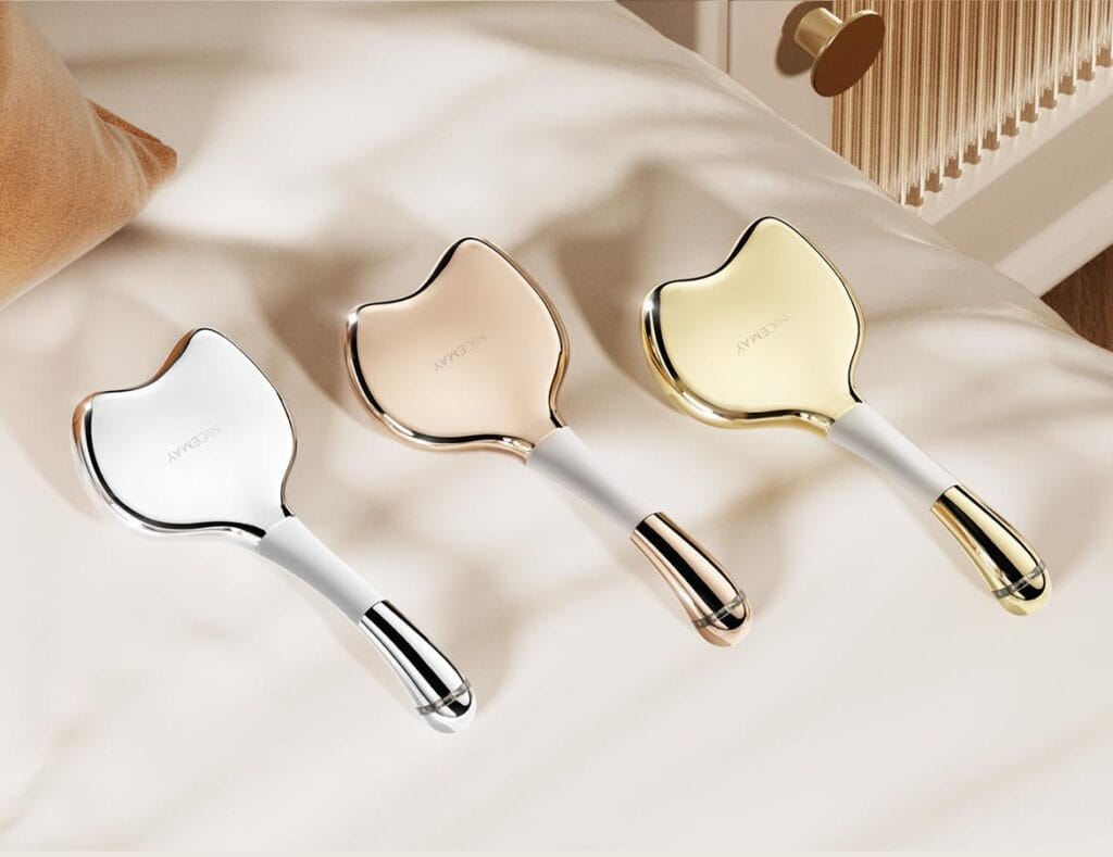 NICEMAY MR-2389 facial massage sticks shown in white, rose gold, and gold finishes.