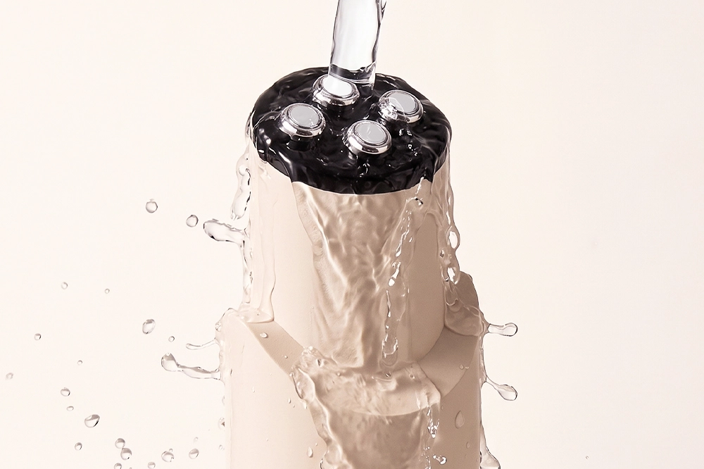 NICEMAY YM-1913 eye-care device shown with splashing water.
